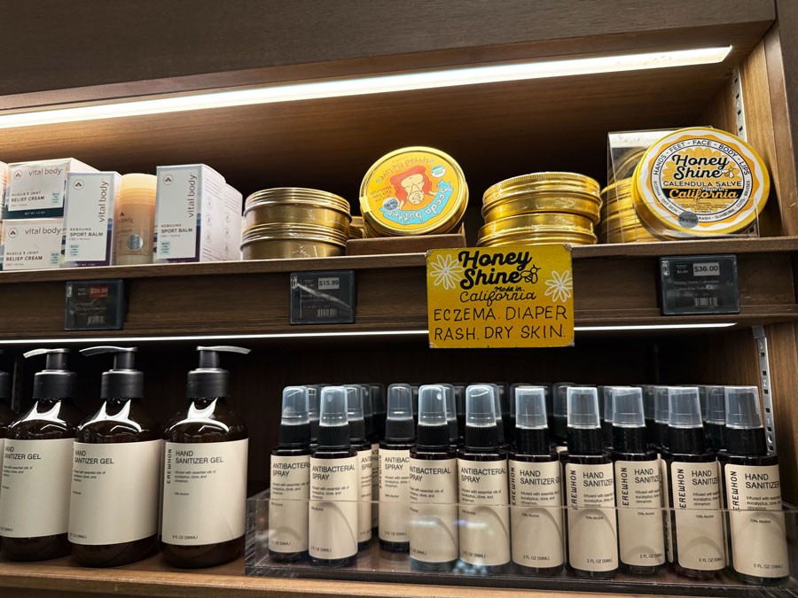 Honey Shine calendula salve, body balms, and Erewhon hand sanitizers.